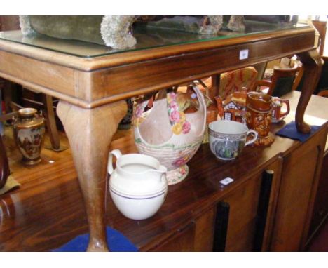 A similar period Indian hardwood low occasional table labelled K S Venkatesam Niadu & Co., Madras