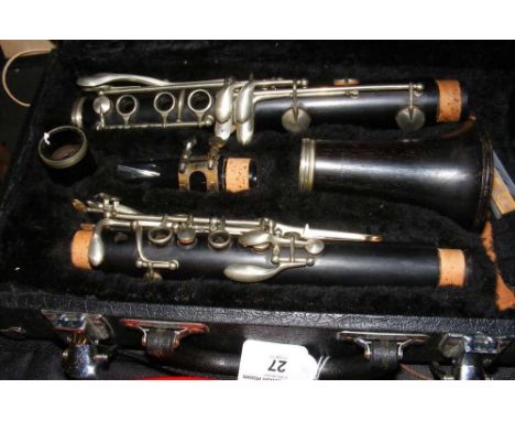 A wooden clarinet in fitted carrying case