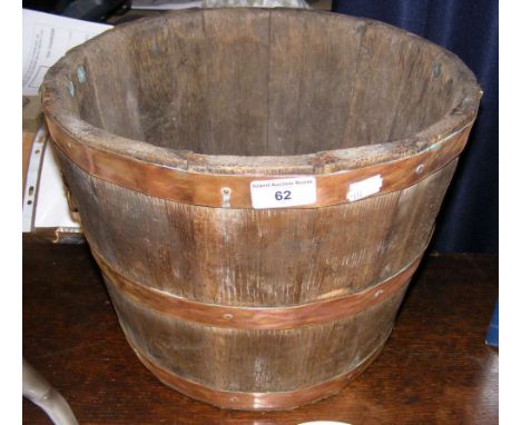 A 34cm diameter copper bound oak "barrel" planter