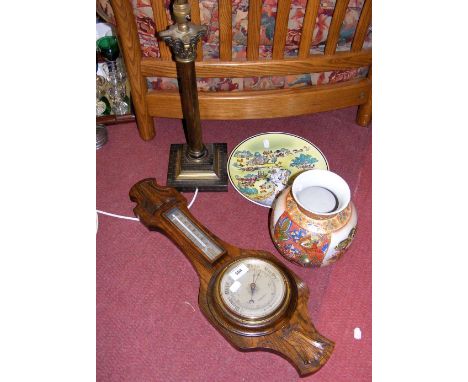 An oak cased barometer/thermometer, together with table lamp, etc.