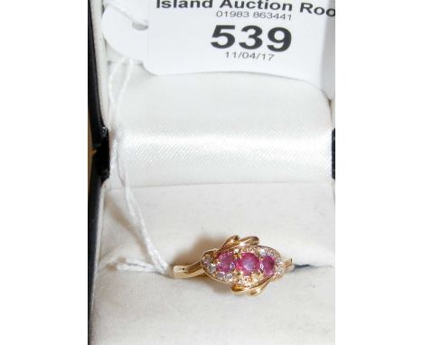 A 9ct yellow gold ruby and diamond dress ring