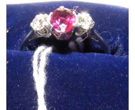 Ruby and diamond ring in 18ct white gold setting