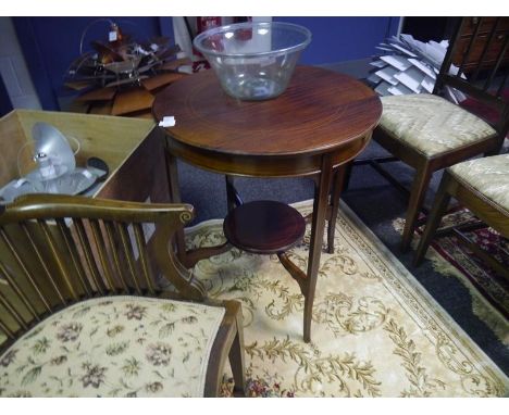 Early 20th century inlaid mahogany occasional table, of circular form, on splayed legs, joined by a shelf stretcher. 0.70m by