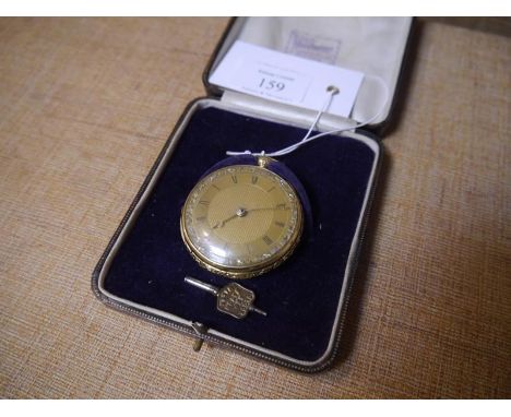Edwardian 18ct gold open face pocket watch, the engine turned gilt face with Roman numerals, the case chased with a band of s