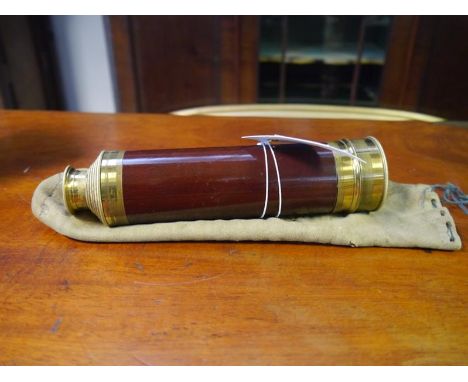 Brass and mahogany five draw telescope, c. 1900, in its original kid bag, unnamed. Extended c. 70cm