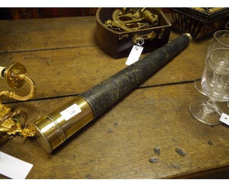 A late 19th century brass and leather single draw telescope Extended 80cm