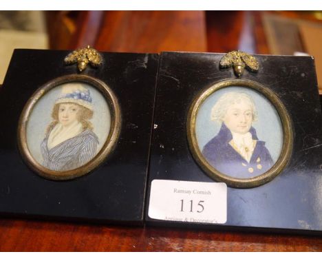 Pair of portrait miniatures of a lady and gentleman, c. 1800, the gentleman in brass-buttoned blue coat, the lady in be-ribon