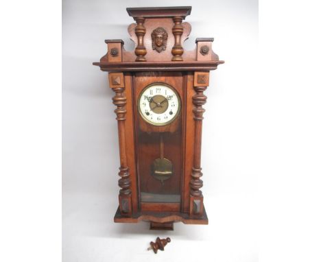 German walnut Vienna type wall clock, 6" brass dial, Roman chapter ring, unsigned two train movement striking on a gong, H89c