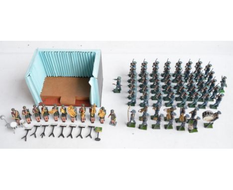 Collection of painted metal soldier figures to include seated Women's Army Band from Soldier Soldier (with background), an RA