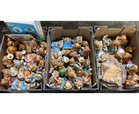 Collection of Pendelfin rabbit figures, approx. 50, display stand, and related ephemera (3 boxes)