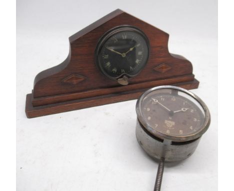North &amp; Sons Ltd., Watford &amp; London, 8 day painted brass car clock, signed black Roman dial, in oak desk mount, H15cm