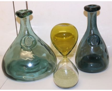 Two Holmegaard green glass decanters/carafes with Cherry Elsinore seals to neck, designed by Ole Winther, max. H23cm; and a y