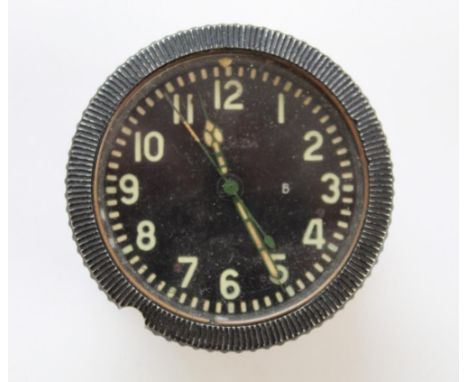 Soviet aircraft/tank bulkhead clock. Luminous numbers hands and second hand. Stamped on face in Russian script