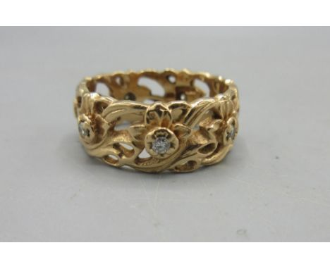 14ct rose gold openwork foliage detail ring, set with diamonds, size O1/2, stamped 585, 6.7g