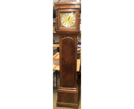 20th Century oak 8 day longcase clock, 11" brass dial with matted centre, applied silvered Roman chapter ring and spandrels, 