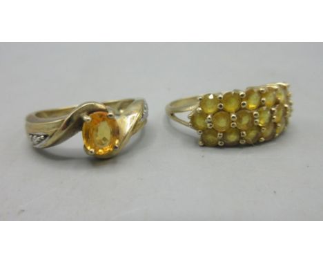 9ct yellow gold ring set with single orange sapphire in twist setting on diamond set shoulders, size M1/2, and a 9ct yellow g