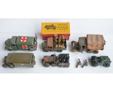 Collection of metal vintage army vehicles to include drivers and crew including a W. Britain's Beetle Lorry with box and adde