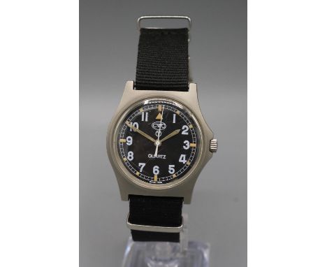 C.W.C. - CWC - Cabot Watch Company British Military Issue, Royal Marines stainless steel quartz wristwatch, signed black Arab