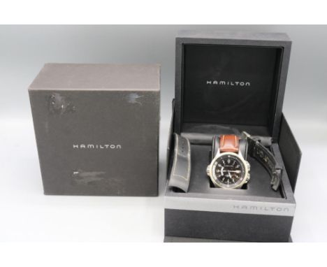 Hamilton Khaki Field stainless steel automatic wristwatch with day date and world time function, signed black Arabic dial wit