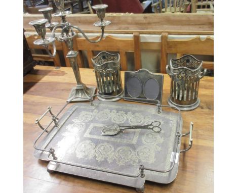 Adam style EPNS three branch four light candelabra, pair of EPNS bottle coasters, a rectangular two handled galleried tray, a