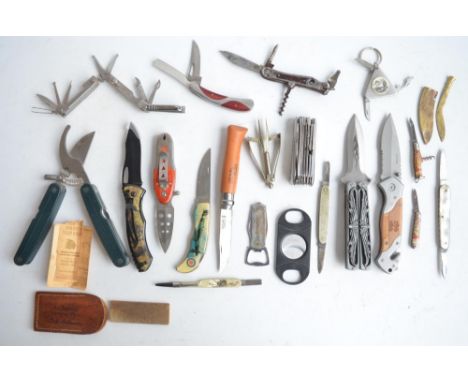 Collection of pocket knives, multi-tools, cigar cutter, bottle opener, a sharpening stone etc. (22)