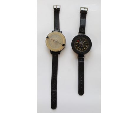 Two WWII Luftwaffe pilots wrist compass. Bakelite bodies Ref' number Fl 23235. Leather straps, both in good working order