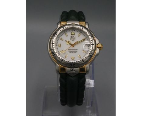 Tag Heuer 200M stainless steel chronometer automatic wristwatch with date, signed white dial, centre seconds, signed screw on