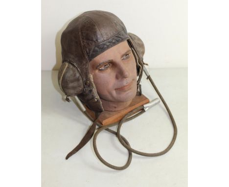 RAF Reliance Manufacturing Co. no. 3 flying helmet, dated 1939-40, complete with original headset. Also will realistic vintag