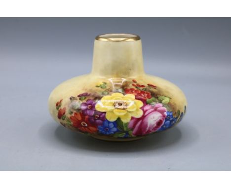 Royal Worcester squat vase of compressed form, 2491, painted decoration of flowers, signed Freeman, H8cm