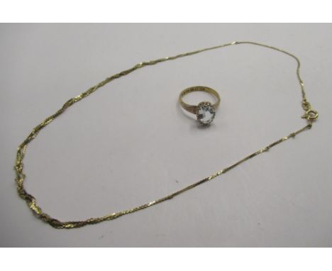 18ct yellow gold fine twist necklace, stamped 750, and a 18ct gold ring set with pale blue stone, stamped 18, size Q, 6.46g