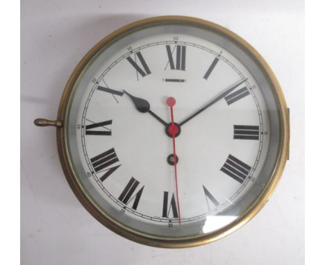 20th Century Smiths Industries Limited, Royal Navy Issue brass ships bulkhead clock, 8" cream painted Roman dial, centre seco