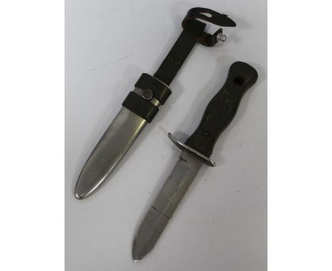 German Bundeswehr knife, complete with steel scabbard and leather frog, stamped OFW-C9 to ricasso. Blade L12.5cm