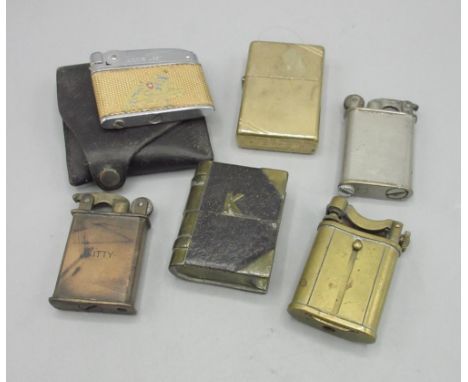 Brass Zippo lighter and four other similar petrol lighters