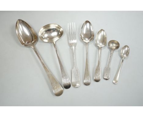 A collection of George III and later silver flatware including a sauce ladle, six Old English pattern tablespoons and a fiddl