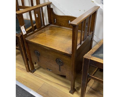 An Art Nouveau copper mounted oak commode, width 55cm, depth 45cm, height