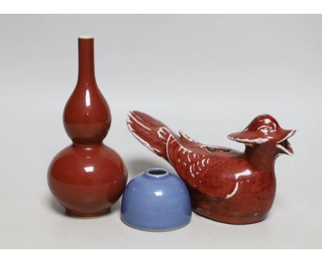 A small Chinese sang de boeuf glazed double gourd vase, 17cm high, and a Chinese sang de boeuf cockerel and blue glazed inkwe