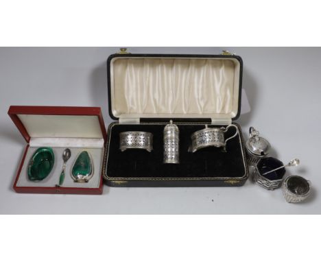 A modern cased silver three piece condiment set, a similar Danish enamelled sterling set (a.f.) and three other condiments in