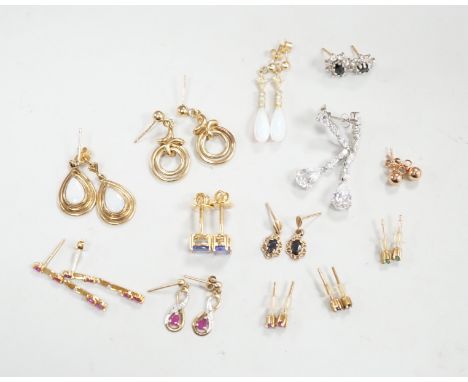 Ten assorted pairs of 9ct and 9ct and gem set earrings, including white opal, gross weight 22.3 grams, together with three ot