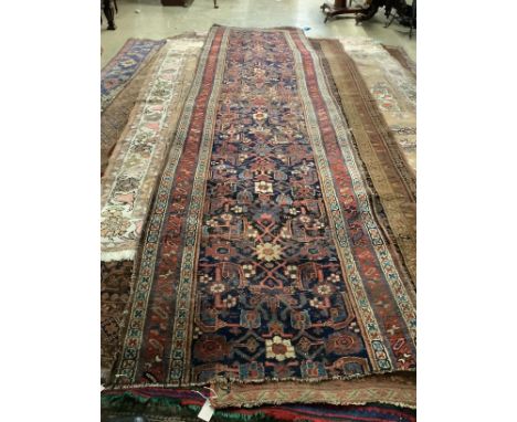 A Persian Bidjar blue ground runner, 433 x 107cm