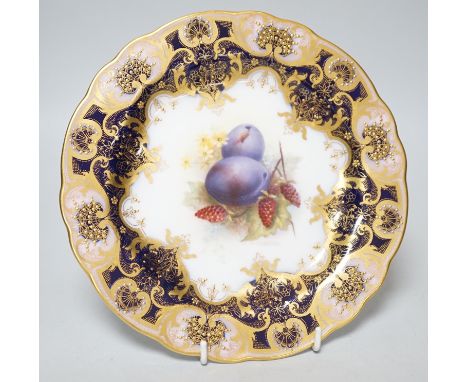 A Royal Worcester plate painted with fruit and berries by R. Sebright, signed, under a blue and gilt ground, date mark 1918