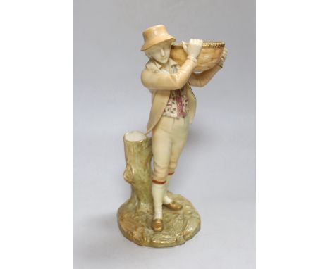 A Royal Worcester figure of a boy, highlighted in gold, with a wicker basket in his hands, painted in blush ivory, shape 880,