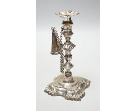 A George II cast silver taper stick, William Gould, London, 1751, with later George IV extinguisher and unmarked sconce, 13.3