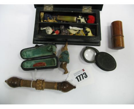 A Treen Bobbin Holder, novelty miniature animals/figures, contained in a hallmarked silver mounted box.