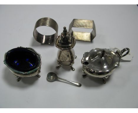 A Hallmarked Silver Three Piece Cruet Set, two hallmarked silver napkin rings (engine turned). 