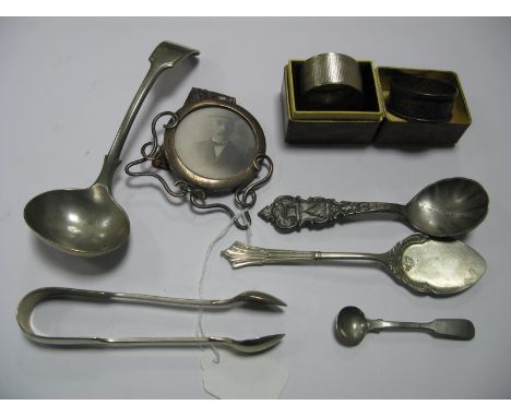 Hallmarked Silver Napkin Rings, a decorative hallmarked silver photograph frame, on easel back (damaged), "TINN" pewter souve