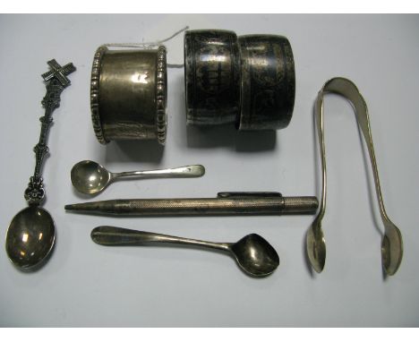 Pair of Niello Napkin Rings; together with a hallmarked silver napkin ring, hallmarked silver sugar tongs, souvenir windmill 