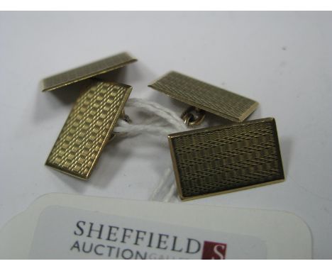 A Pair of 9ct Gold Gent's Cufflinks, the rectangular engine turned panels on chain connections.
