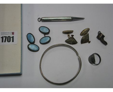 A Pair of Enamel Gent's Cufflinks, of oval design, stamped "Silver England", another pair of gent's cufflinks, of decorative 