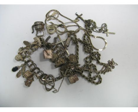 A Double Curb Link Bracelet, stamped "Sterling" to fastener, suspending novelty charms, including a wishing well, a horse sho