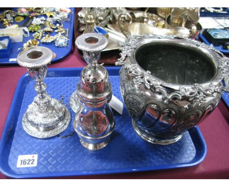 A Highly Decorative Pair of Elkington &amp; Co Plated Candlesticks, each allover detailed in relief, of Continental style, on